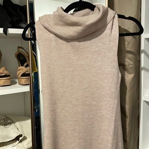 BCBG, very light sweater, midi dress, with a slit in the front.